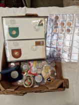 A box of assorted coins, medals and tokens etc.