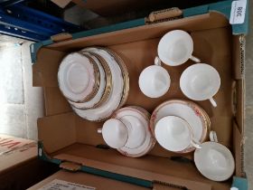 A box of Royal Doulton china, 'Darjeeling' and 'Rhodes', 36 pieces in total.