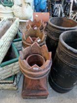 Three chimney pot crowns and another