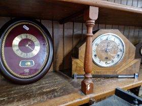 An Art Deco mantle clock and a wall clock.