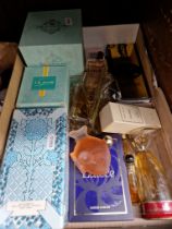 14 vintage perfumes, mostly boxed.