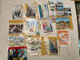 A collection of postcards including travel and transport.