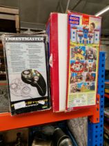 A box of Mega Blox - Lions Kingdom, together with a Thrustmaster freestyler board