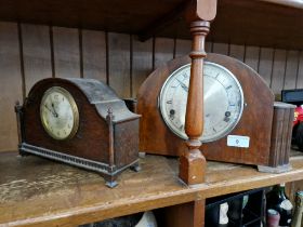 Two mantle clocks, the larger one has key and pendulum
