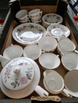 A box of Royal Worcester 'June Garland' teawares including teapot, cups, saucers, jug etc.