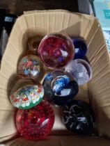 Nine glass paperweights including Caithness and Strathearn Millefiori.