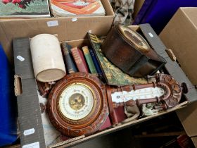 A box of assorted items including a clock, a barometer, pottery, books etc.