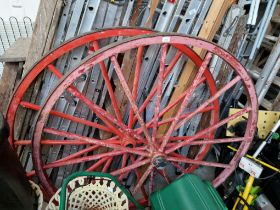 A pair of metal cart wheels with metal rims, diameter 60 inches