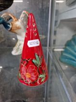 An Anita Harris studio pottery sugar sifter, hand painted and signed in gold.