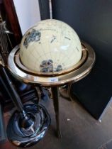 A large terrestrial globe inlaid with semi precious stones.