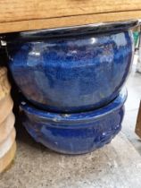 Two large blue glazed planters