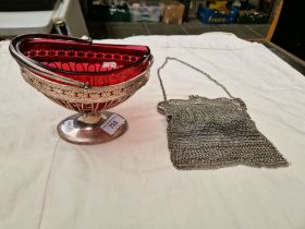 A purse marked 'GERMAN SILVER' and a silver plated sugar basket