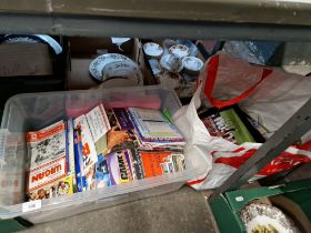 A box and a bag of rugby league programmes