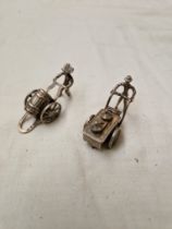A pair of Dutch silver miniature models.
