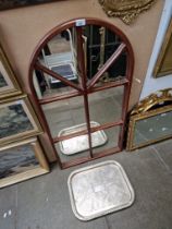 A mahogany framed mirror and a silver plated tray.