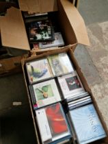 A box of DVD's and a box of Classical CD's