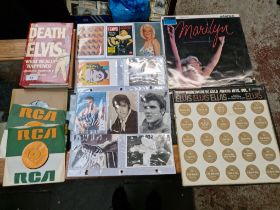 Elvis Presley and Marilyn Monroe memorabilia including vinyl LP records, postcards and first edition