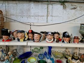 Nine large and one small Royal Doulton character jugs together with a Stirling character jug and a