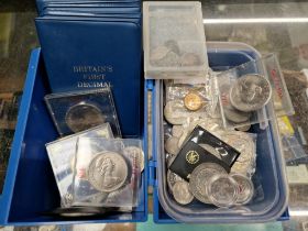 A collection of various UK and world coins.