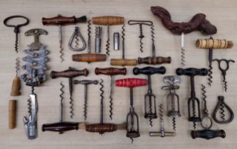 A box of vintage corkscrews