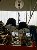 A pair table lamps modelled as dogs and a metal standard lamp.