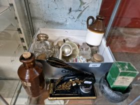 A box of mixed collectables, mostly inkwells including some with silver tops, stoneware ink bottles,