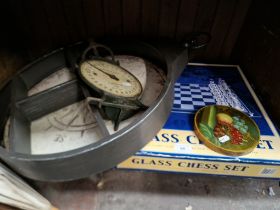 A set of vintage weighing scales (no pan), a boxed glass chess set, and a wall display item with a