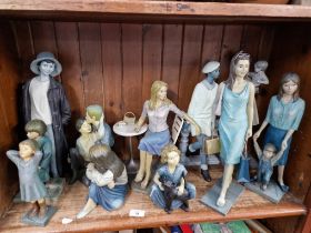 A collection of Enesco Gallery Piazza figures in shades of blue