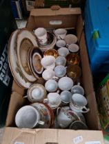 A mixed lot comprising various miniature cups and saucers, silver plated cutlery, Japanese plates