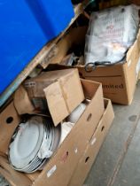 Four boxes of assorted items, unused double electric hotplate, pottery, ultrasonic spectacle