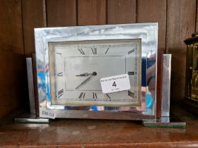 A 1930s Art Deco chrome and bakelite mantle clock.