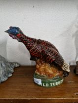 An Austin Nicholls Wild Turkey limited edition ceramic liquor bottle