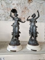 Two spelter figures on plinths bearing titles Happiness and Youth. Height appx 36cm