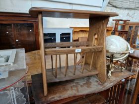 A modern Ercol elm magazine table.