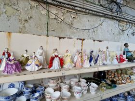 A collection of figurines, Royal Doulton, Coalport, Royalty, etc, 25 in total.