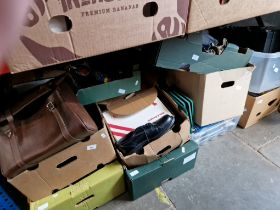 10 boxes of miscellaneous items including metal door stops, kitchen scales, brass weights,