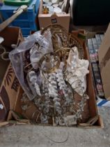 A box of ceiling light fittings with glass droplets