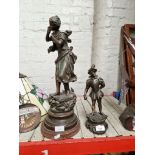 Two spelter figures, one of a lady and the other of a French Cavalier