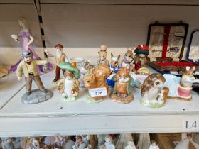 Various Beatrix Potter figurines and ceramics including Beswick, Royal Albert and Royal Doulton,