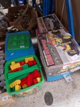 A box of Duplo bricks, radio controlled car, Revell model car, craft items, Hundred Acre Wood