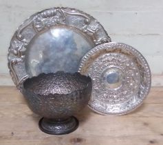 Three pieces of eastern white metal comprising a pedestal bowl and two plates, gross wt. 890g.