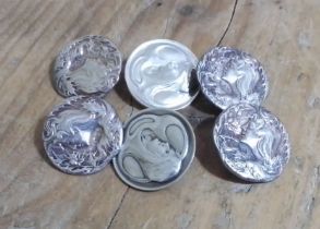 A set of four Edwardian Art Nouveau style silver buttons, Joseph Gloster, Birmingham 1903, and two