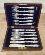 A case set of 12 silver handled fish eaters and a hallmarked silver trinket box.