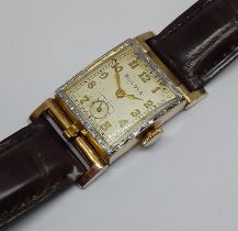 A Bulova Art Deco style gold plated, flip back case, width 21mm, manual wind movement, later croc