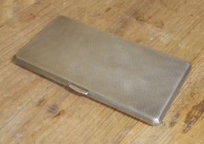 An Art Deco style hallmarked silver cigarette case, length 15.5cm, wt. 7.7ozt.