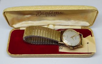 A vintage Bentima Star 9ct gold cased wristwatch, gold plated flexi strap, with original box.