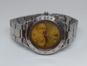 A Movado 1950 stainless steel wristwatch, ref. 84.A5.863, case diam. 38mm, gold tone dial with three