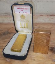 Two vintage lighters: Dunhill & Dupoint.