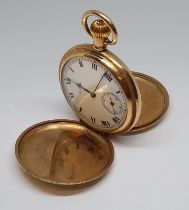 A Waltham Traveller gold plated full hunter pocket watch.
