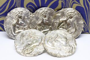 A set of five cast white metal buttons, each depicting a classical figure, diam. 22mm, unmarked,